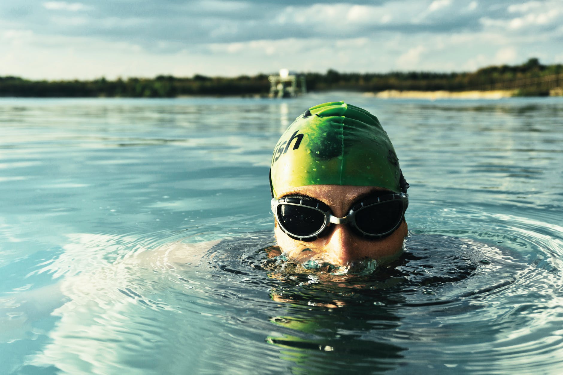 Man enjoying a swim in open water.